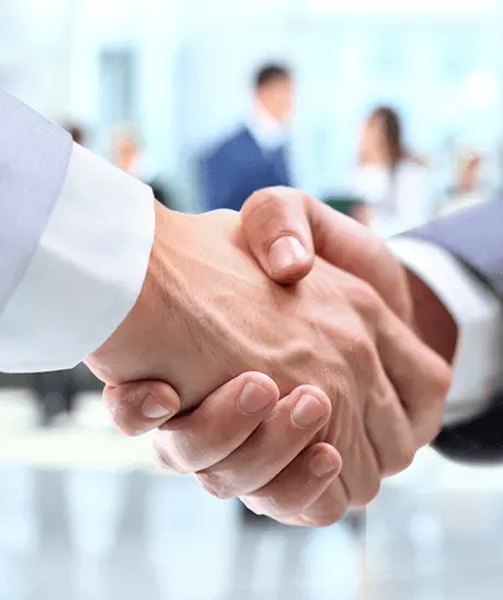 a close-up of hands shaking